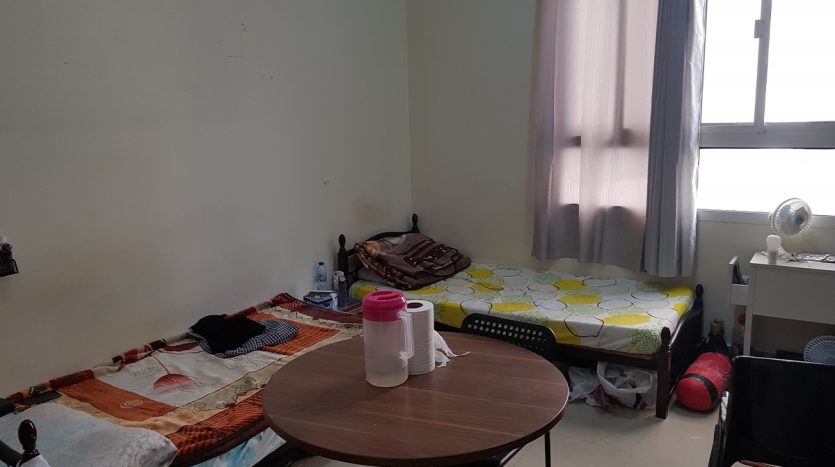 low rent room in Al Quoz.